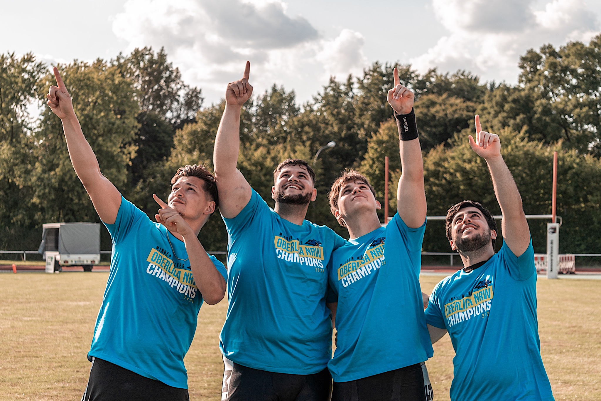 Eric Renz, Ali Omar, Fabrice Steinbach und Dayan Kars nach dem Titelgewinn in Lage (v.l.)- Foto: Minden Wolves